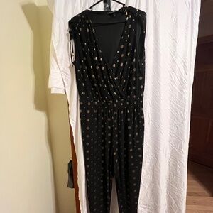 Jump suit. Black and gold